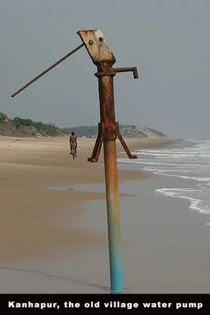 India, Orissa village of Kanhapur, water pump on beach