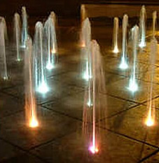 solar fountain illuminated with lights